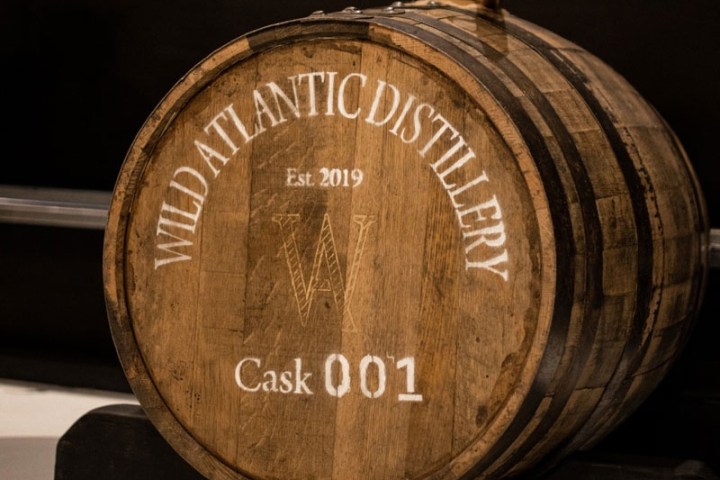Barrel labeled 'Wild Atlantic Distillery, Est. 2019, Cask 001' on a dark background.